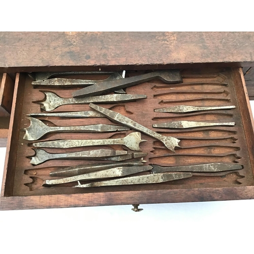 215 - LARGE VICTORIAN PINE TOOL BOX FITTED WITH BANKS OF DRAWERS COMPLETE WITH VICTORIAN TOOLS ETC