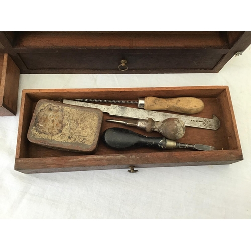 215 - LARGE VICTORIAN PINE TOOL BOX FITTED WITH BANKS OF DRAWERS COMPLETE WITH VICTORIAN TOOLS ETC