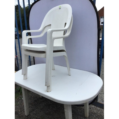 255 - WHITE PLASTIC GARDEN TABLE AND 4 CHAIRS