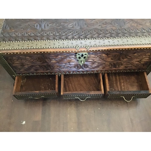 466 - HEAVILY CARVED BRASS BOUND ZANZIBAR BLANKET BOX WITH 3 DRAWERS 
45 X 19
H 19