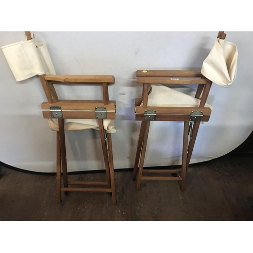 486 - 2 FOLDING DIRECTORS CHAIRS AND A LINEN BASKET