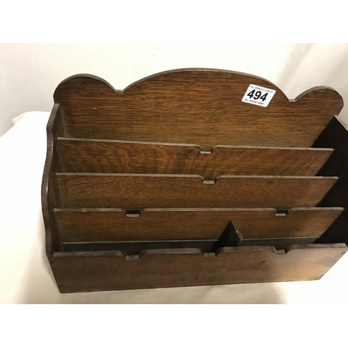 494 - VINTAGE MAHOGANY FOLDING CAKE STAND WITH BRASS CARRY HANDLE AND AN OAK LETTER RACK