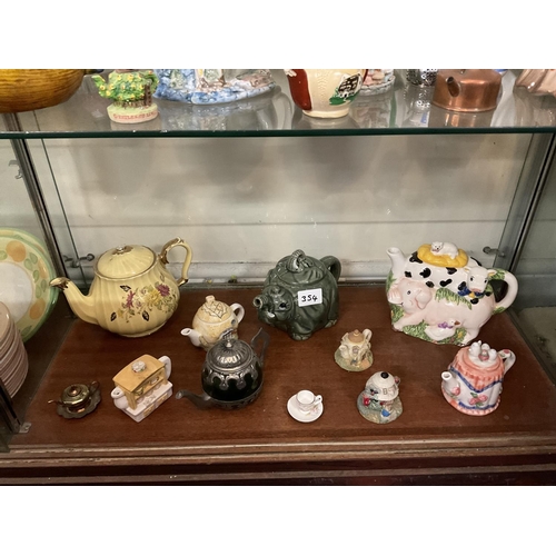 354 - LARGE COLLECTION OF NOVELTY TEAPOTS