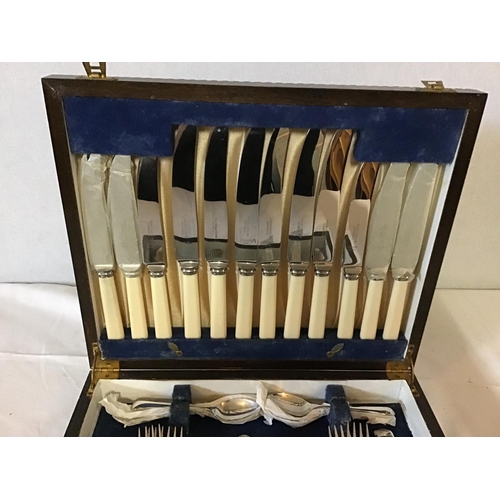 277 - 2 VINTAGE CANTEENS OF CUTLERY