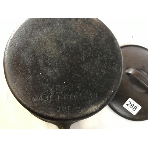 288 - 2 CAST IRON COOKING PANS WITH COVERS