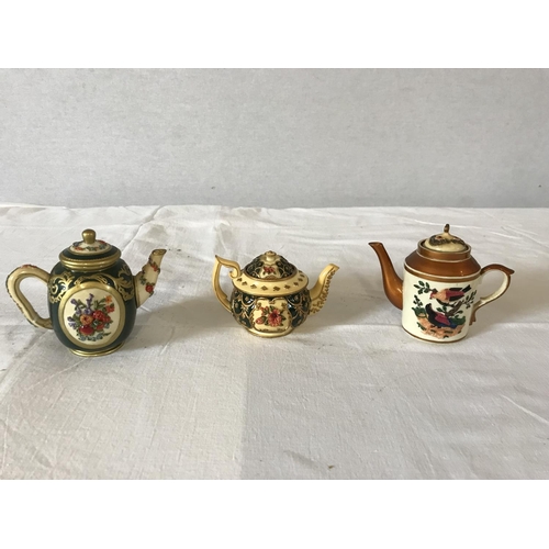 290 - MAYFAIR MINIATURE COLLECTORS TEA POTS WITH SOME BOXES AND CERTIFICATES