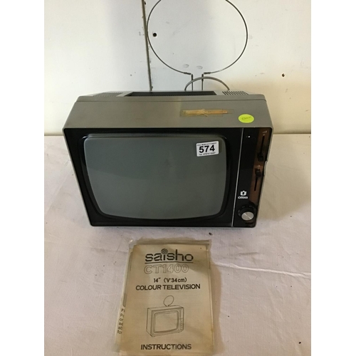 574 - VINTAGE ULTRA PORTABLE TV COMPLETE WITH INSTRUCTIONS W/O