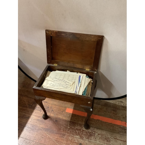 610 - MAHOGANY  PIANO STOOL ON CABRIOLE  LEGS COMPLETE WITH SHEET MUSIC
19 X 13