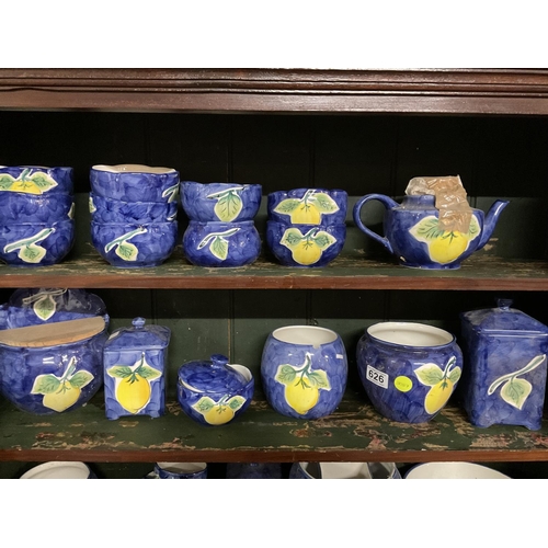 626 - QTY OF BLUE POTTERY WITH FRUIT DESIGN TO INC BOWLS STORAGE JARS TEA POTS WATER JUGS ETC (CHINA ONLY)