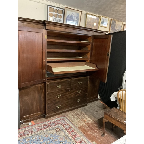 632 - GEORGIAN BREAK FRONT MAHOGANY COMPACTOM WARDROBE. 2 CUPBOARD DOORS OVER 4 DRAWERS FLANKED BY 2 HANGI... 