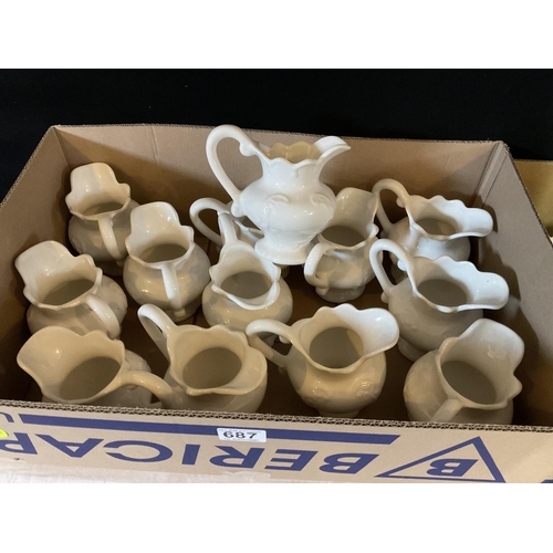 687 - 2 BOXES OF WHITE CHINA WATER JUGS