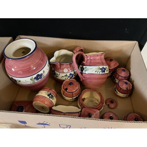 690 - 2 BOXES OF PINK GLAZED POTTERY WITH FLORAL PATTERN TO INCLUDE DINING PLATES WATER JUGS VASES ETC