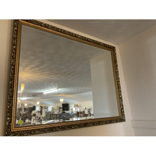 694 - LARGE MODERN GILT FRAMED MIRROR 34 X 44