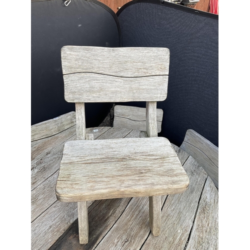 50 - LARGE OAK GARDEN TABLE WITH 6 HEAVY MATCHING WOODEN CHAIRS STAMPED ACORN HARDWOOD FURNITURE
DIA 55