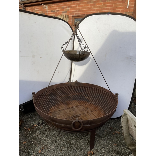 54 - OVER SIZED CAST IRON GARDEN FIRE PIT ON STAND WITH COOKING POT ON TRIPOD COMPLETE WITH METAL COOKING... 