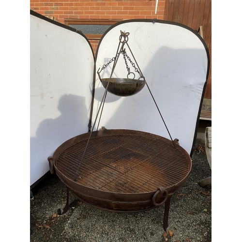 54 - OVER SIZED CAST IRON GARDEN FIRE PIT ON STAND WITH COOKING POT ON TRIPOD COMPLETE WITH METAL COOKING... 