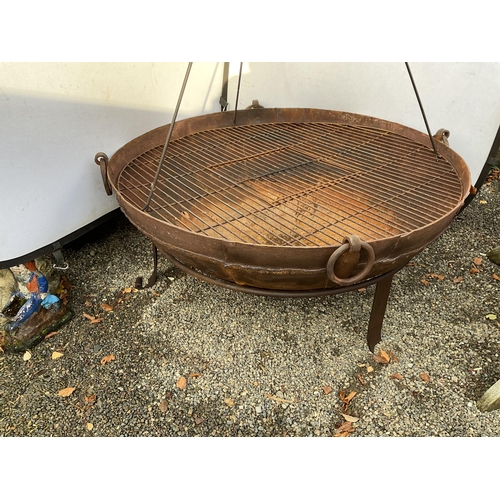 54 - OVER SIZED CAST IRON GARDEN FIRE PIT ON STAND WITH COOKING POT ON TRIPOD COMPLETE WITH METAL COOKING... 