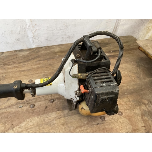 82 - STIHL PETROL STRIMMER