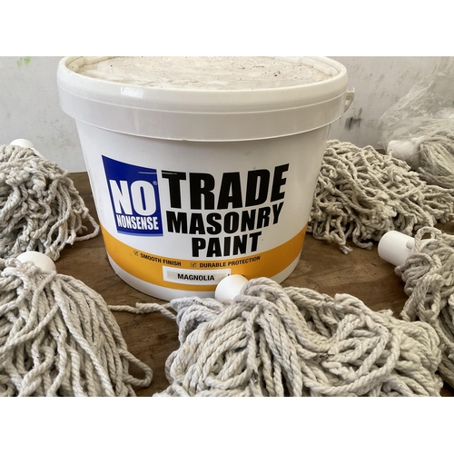 156 - TUB OF MASONARY PAINT AND A BOX OF MOP HEADS