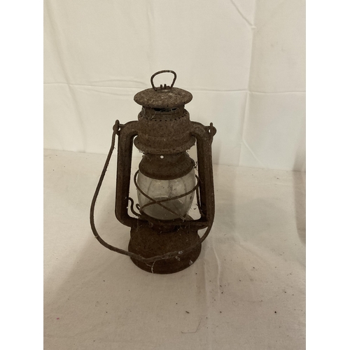 306 - 2 VINTAGE STORM LAMPS