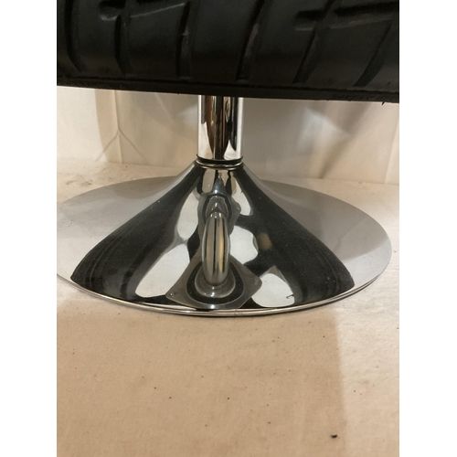 474 - HAND MADE ALLOY WHEEL AND TYRE ON CHROME PEDESTAL BASE WITH GLASS TOP REVOLVING COFFEE TABLE
DIA 23