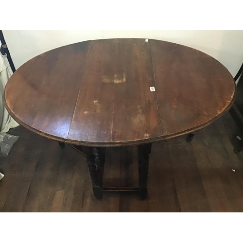 408 - OAK BARLEY TWIST GATE LEG DINING TABLE
L 53