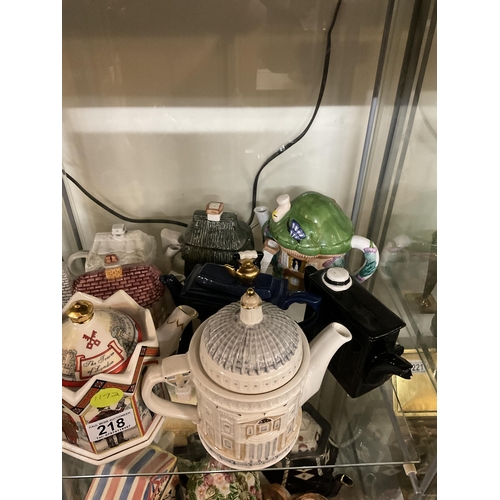 218 - LARGE QTY OF NOVELTY TEA POSTS COTTAGE WARE ITEMS ETC