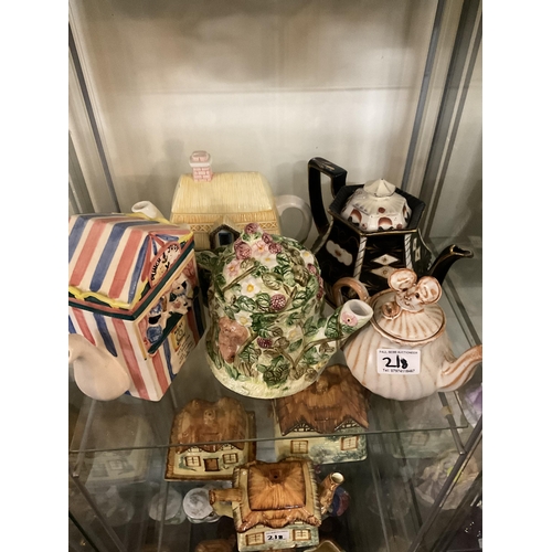 218 - LARGE QTY OF NOVELTY TEA POSTS COTTAGE WARE ITEMS ETC
