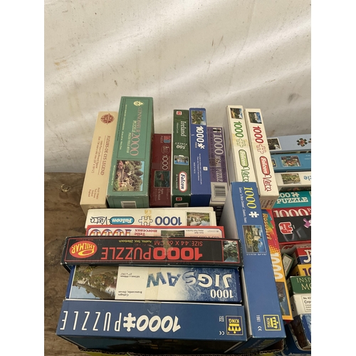 76 - 3 BOXES OF JIGSAWS