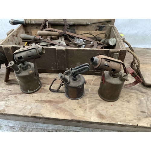 112 - WOODEN BOX OF ODDS TO INCLUDE BRASS BLOW LAMPS ETC