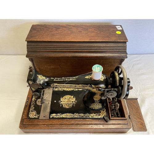 8 - CASED SINGER SEWING MACHINE