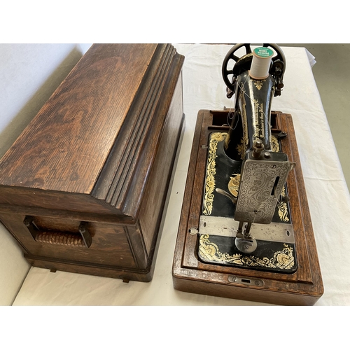 8 - CASED SINGER SEWING MACHINE