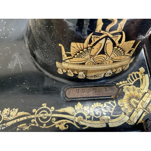 8 - CASED SINGER SEWING MACHINE