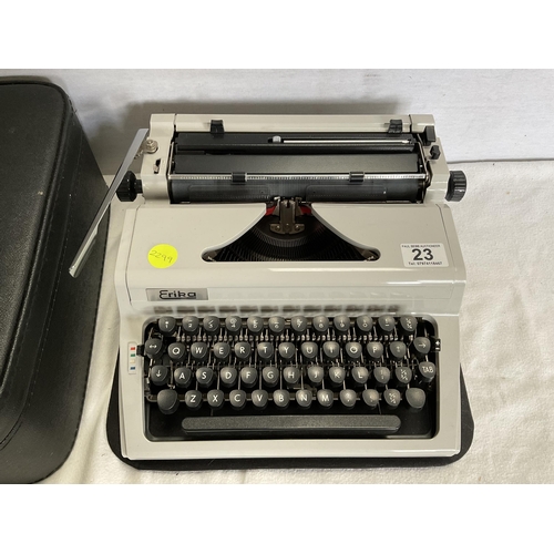 23 - ERIKA VINTAGE TYPEWRITER IN CASE