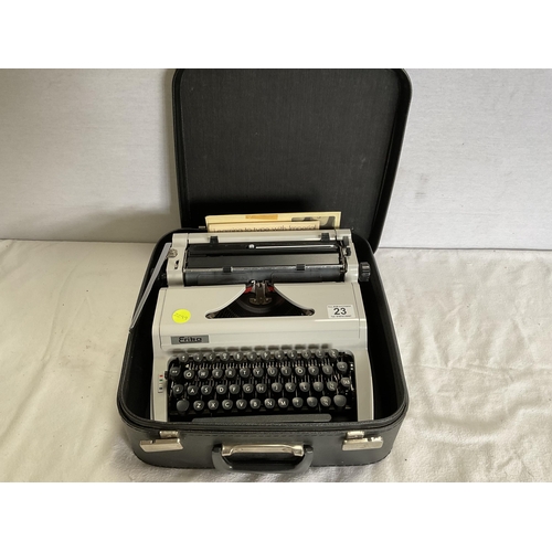 23 - ERIKA VINTAGE TYPEWRITER IN CASE