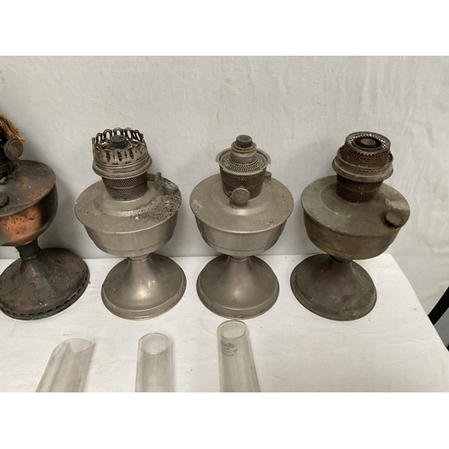 40 - QTY OF PARAFFIN LAMPS, CHIMNEYS ETC