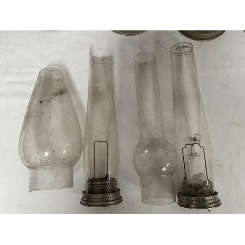 40 - QTY OF PARAFFIN LAMPS, CHIMNEYS ETC