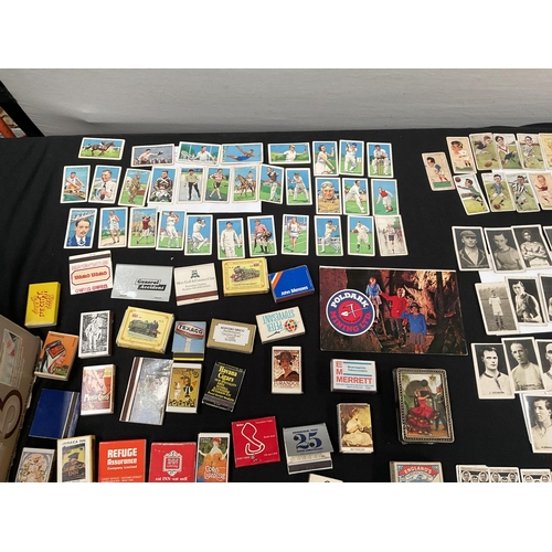 124 - QTY OF MATCHBOXES, POSTCARDS AND CIGARETTE CARDS