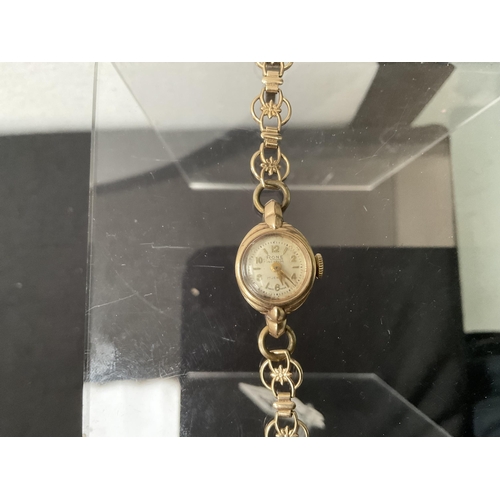 144 - 9CT GOLD CASED WITH 9CT BRACELET RONE LADIES WATCH - INCABLOC 17 JEWELS
TOTAL WIEGHT 11 GRAMS