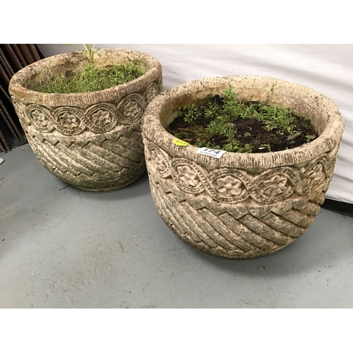 174 - PAIR OF DECORATIVE CONCRETE PLANTERS - H12