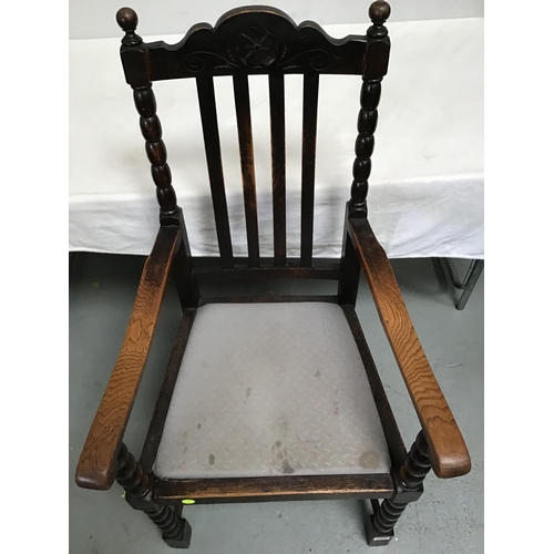 220 - OAK ARMCHAIR WITH BOBBIN DECORATION (STRETCHER MISSING)