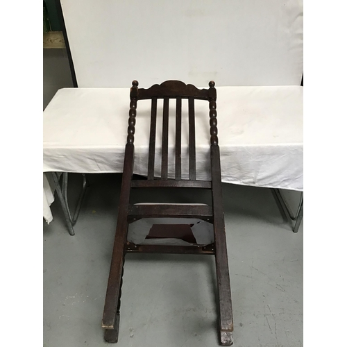 220 - OAK ARMCHAIR WITH BOBBIN DECORATION (STRETCHER MISSING)