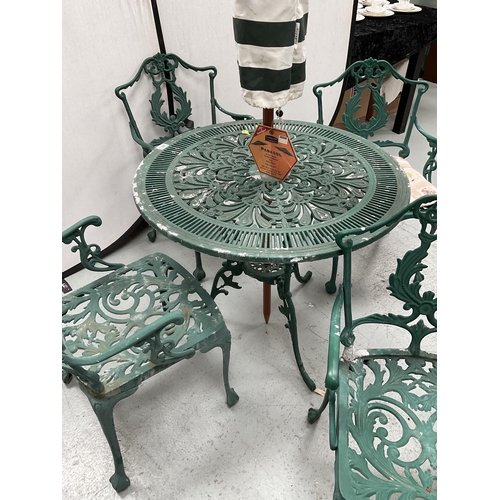 283 - ORNATE GARDEN TABLE AND 4 MATCHING ARMCHAIRS C/W BROLLY - TABLE H27