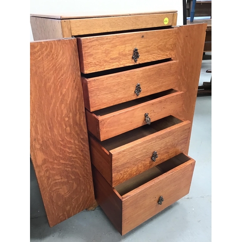 300 - GOLDEN OAK 2 DOOR CABINET FITTED WITH 5 GRADUATED DRAWERS - H36