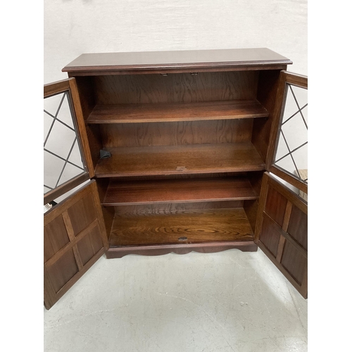 322 - PRIORY OAK 4 DOOR GLAZED TOP BOOKCASE - H43