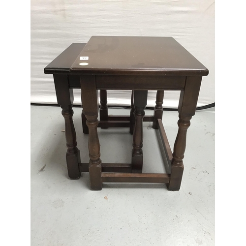 347 - NEST OF 2 DARK OAK TABLES - H19