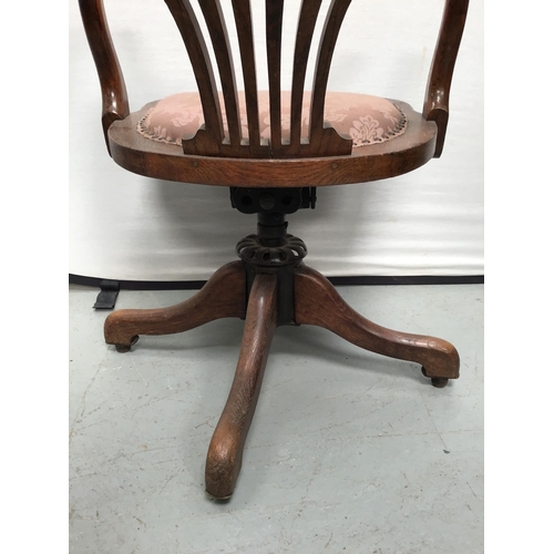 352 - VINTAGE OAK SWIVEL OFFICE CHAIR