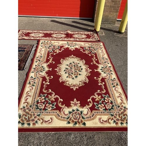 381 - 4 PATTERENED CARPETS
LARGE RED 91