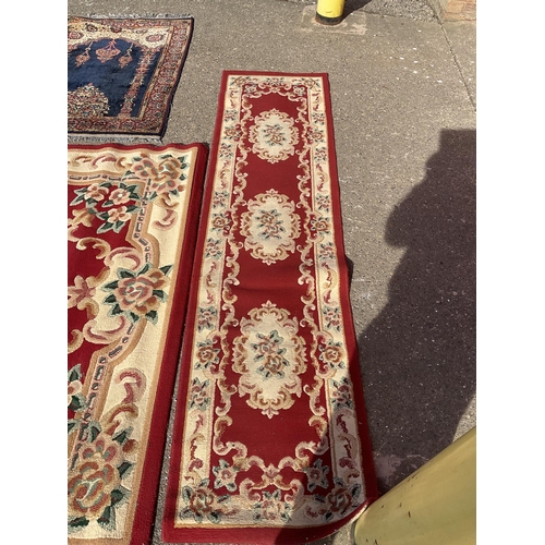 381 - 4 PATTERENED CARPETS
LARGE RED 91