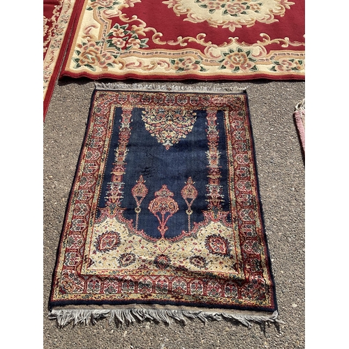 381 - 4 PATTERENED CARPETS
LARGE RED 91